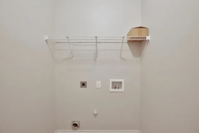 a view of a room with racks on the wall