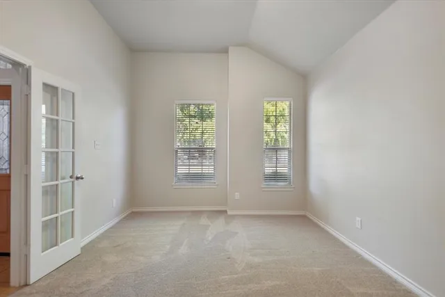 an empty room with windows