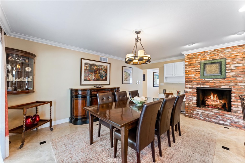 3214 Dakota Avenue Costa Mesa, CA 92626 - Photo 8 of 32 Spacious Dining adjacent to Kitchen with its own fireplace.