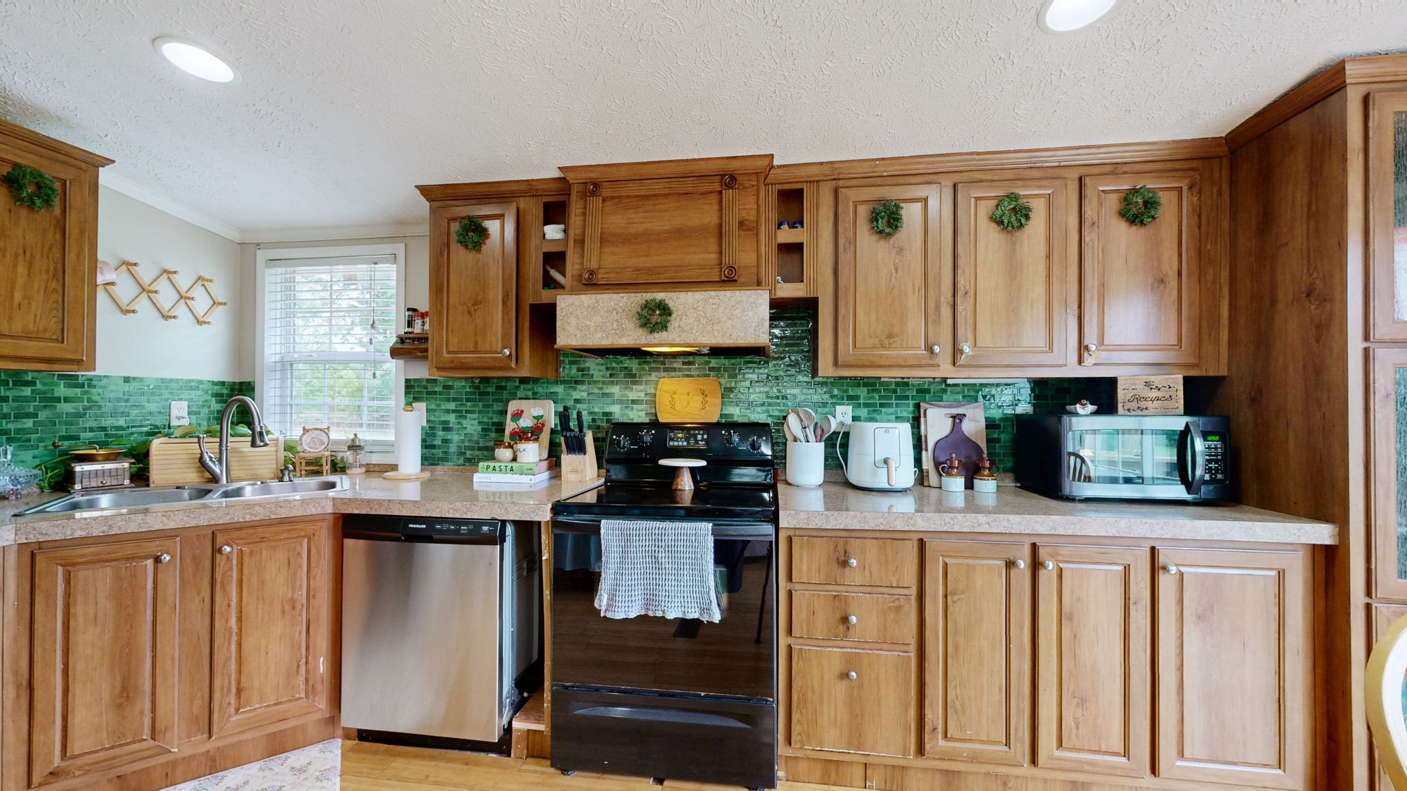 133 Cleveland Road Wartrace, TN 37183 - Photo 5 of 23 a kitchen with stainless steel appliances granite countertop a sink and cabinets