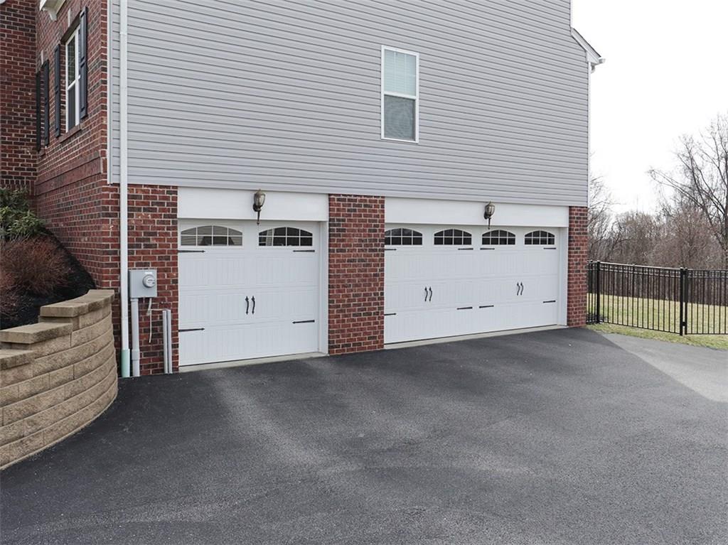 349 Rocky Ridge Road Bethel Park, PA 15102 - Photo 22 of 24 Three car side entry garage with level driveway.