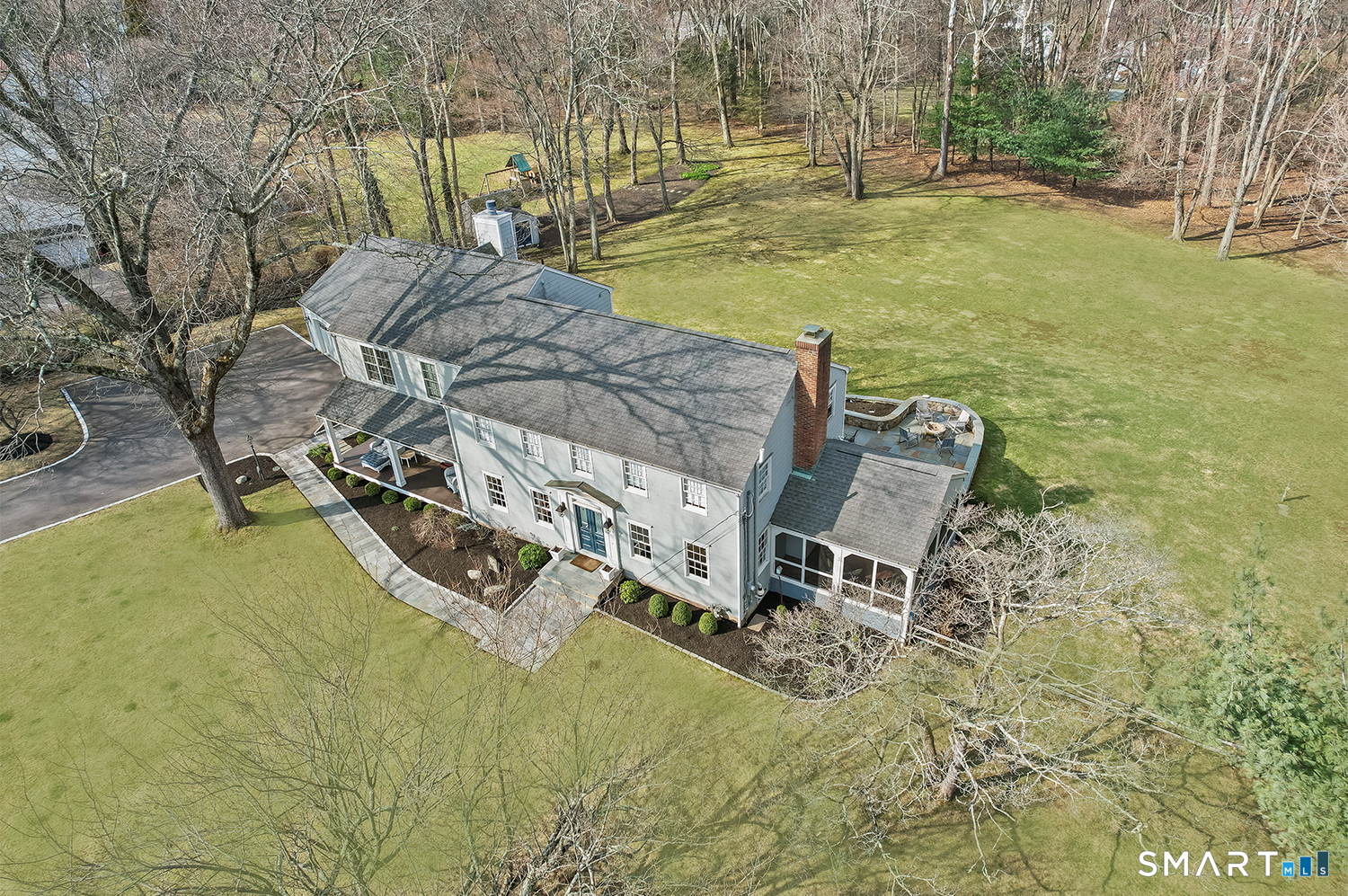 320 Warner Hill Road Fairfield, CT 06890 - Photo 1 of 1 a view of a yard with chairs