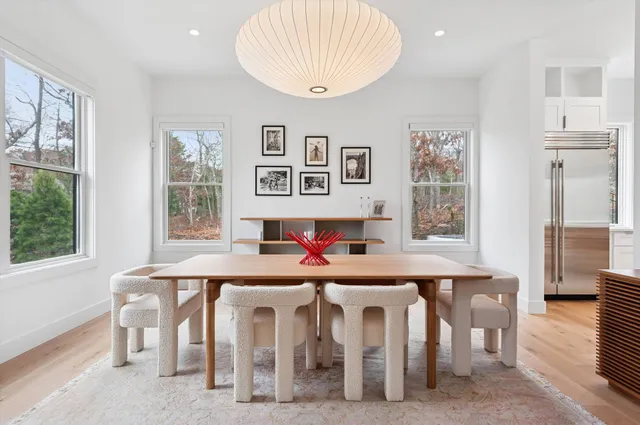 a table room with furniture and window