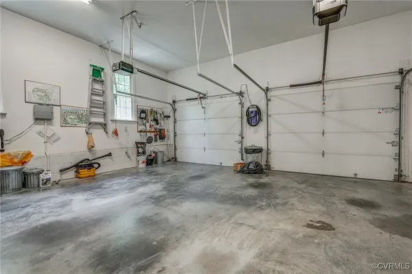 a view of a garage with rack and bicycle
