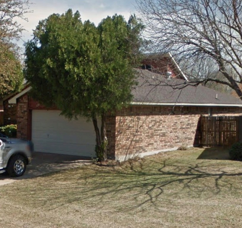 6301 Minuteman Lane Arlington, TX 76002 - Photo 7 of 7 a view of a backyard of the house