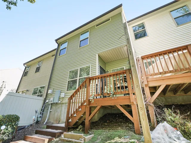 a bathroom with a double vanity sink and mirror