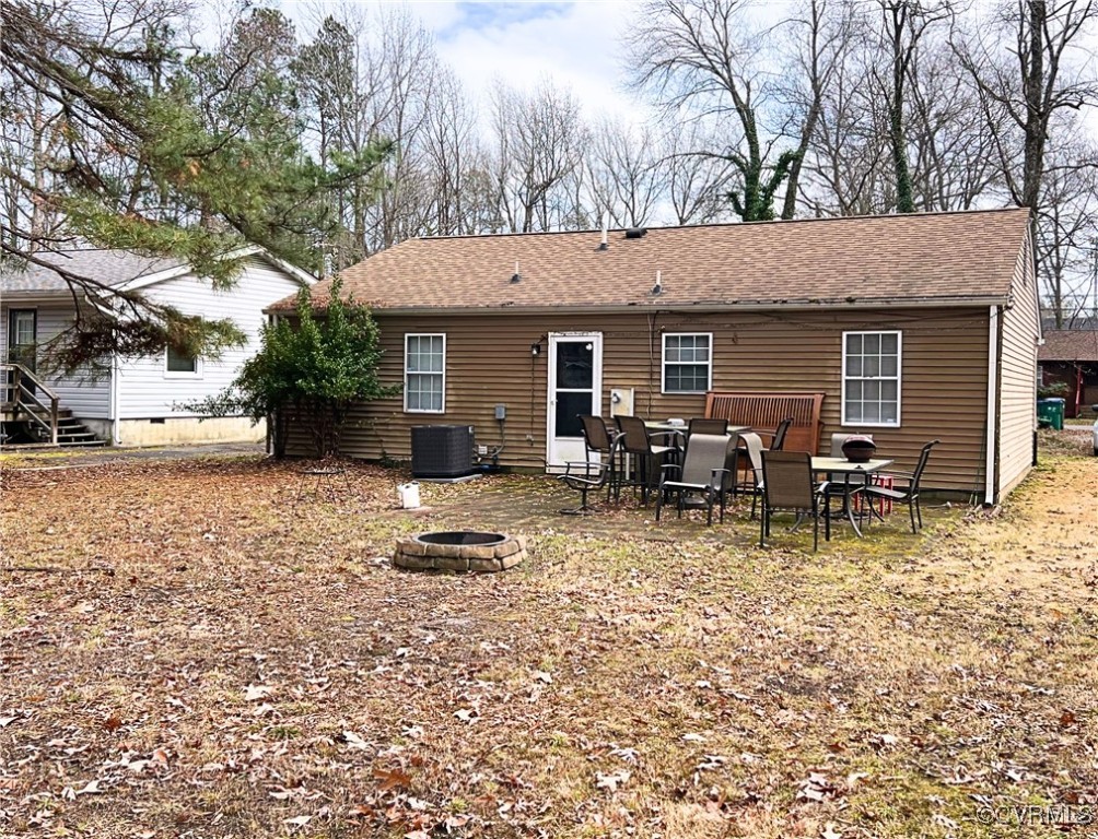 1200 Hodges Road Richmond, VA 23224 - Photo 20 of 23 Rear view of property with central AC and an outdo