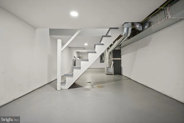 a view of a room with white walls