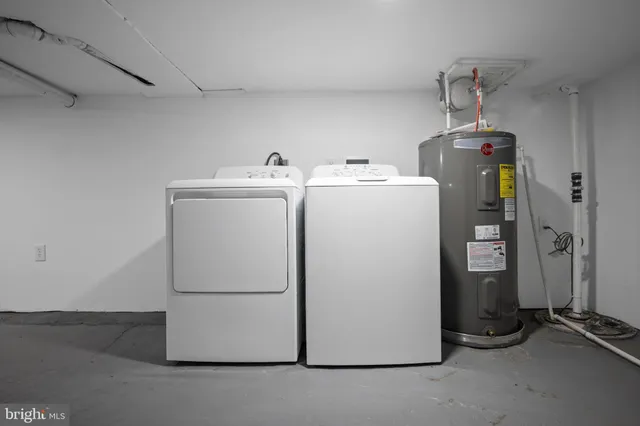 a view of a brick house with many windows
