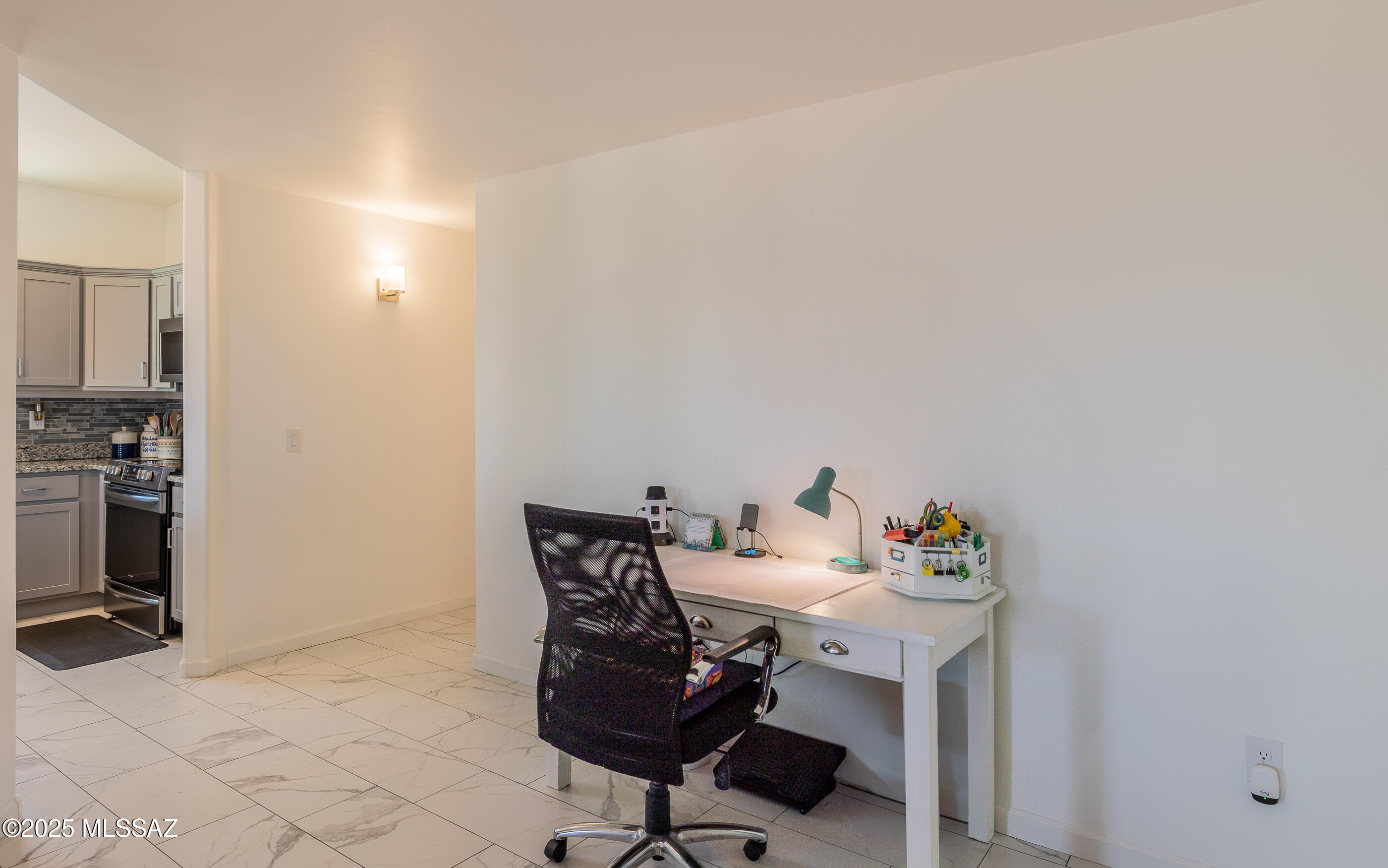 12123 Creosote Valley Road Vail, AZ 85641 - Photo 15 of 46 a view of a workspace with furniture