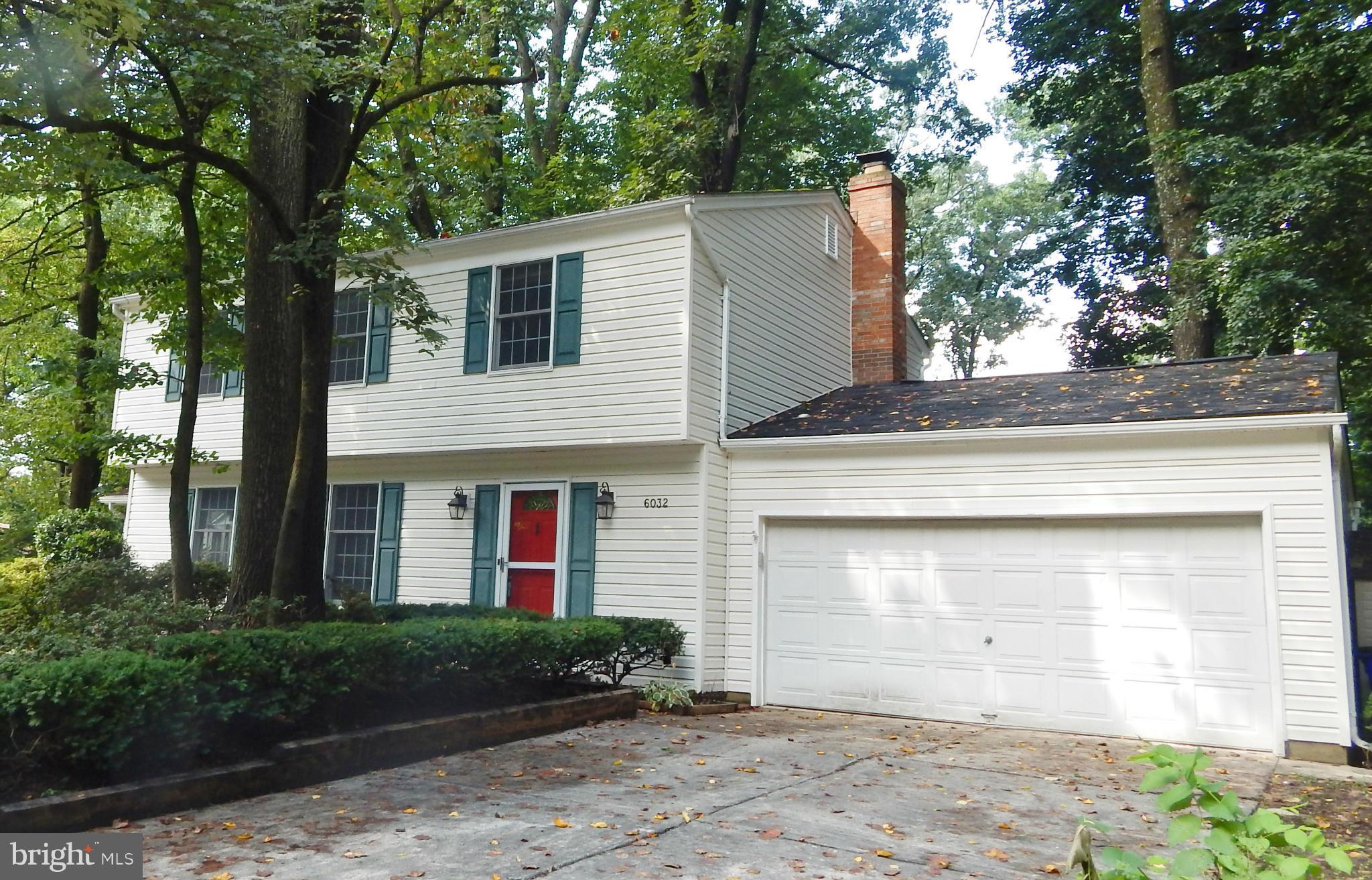 6032 Stevens Forest Road Columbia, MD 21045 - Photo 1 of 29 a front view of a house with garden