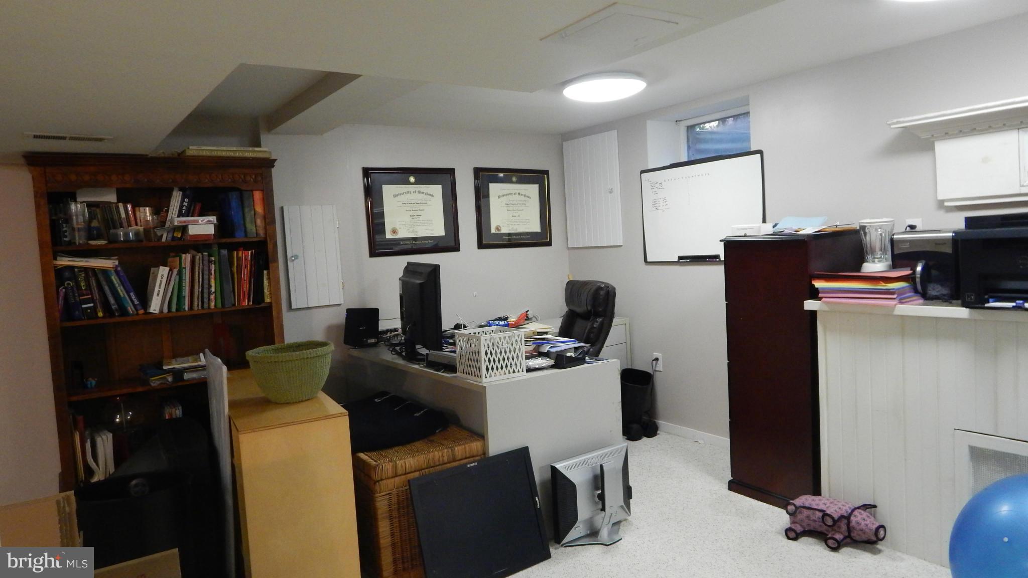 6032 Stevens Forest Road Columbia, MD 21045 - Photo 18 of 29 a view of a workspace with furniture and toys