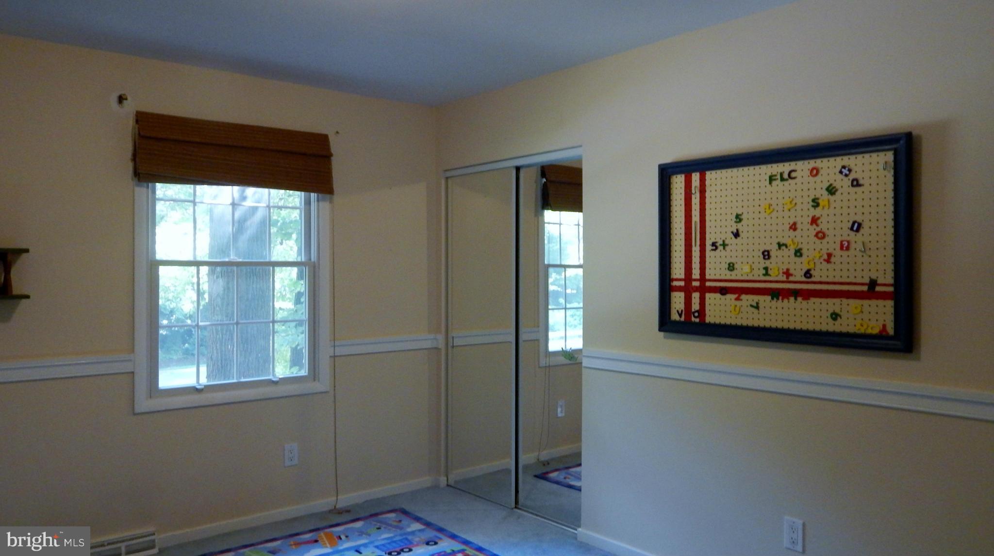 6032 Stevens Forest Road Columbia, MD 21045 - Photo 21 of 29 a front door with wooden floor