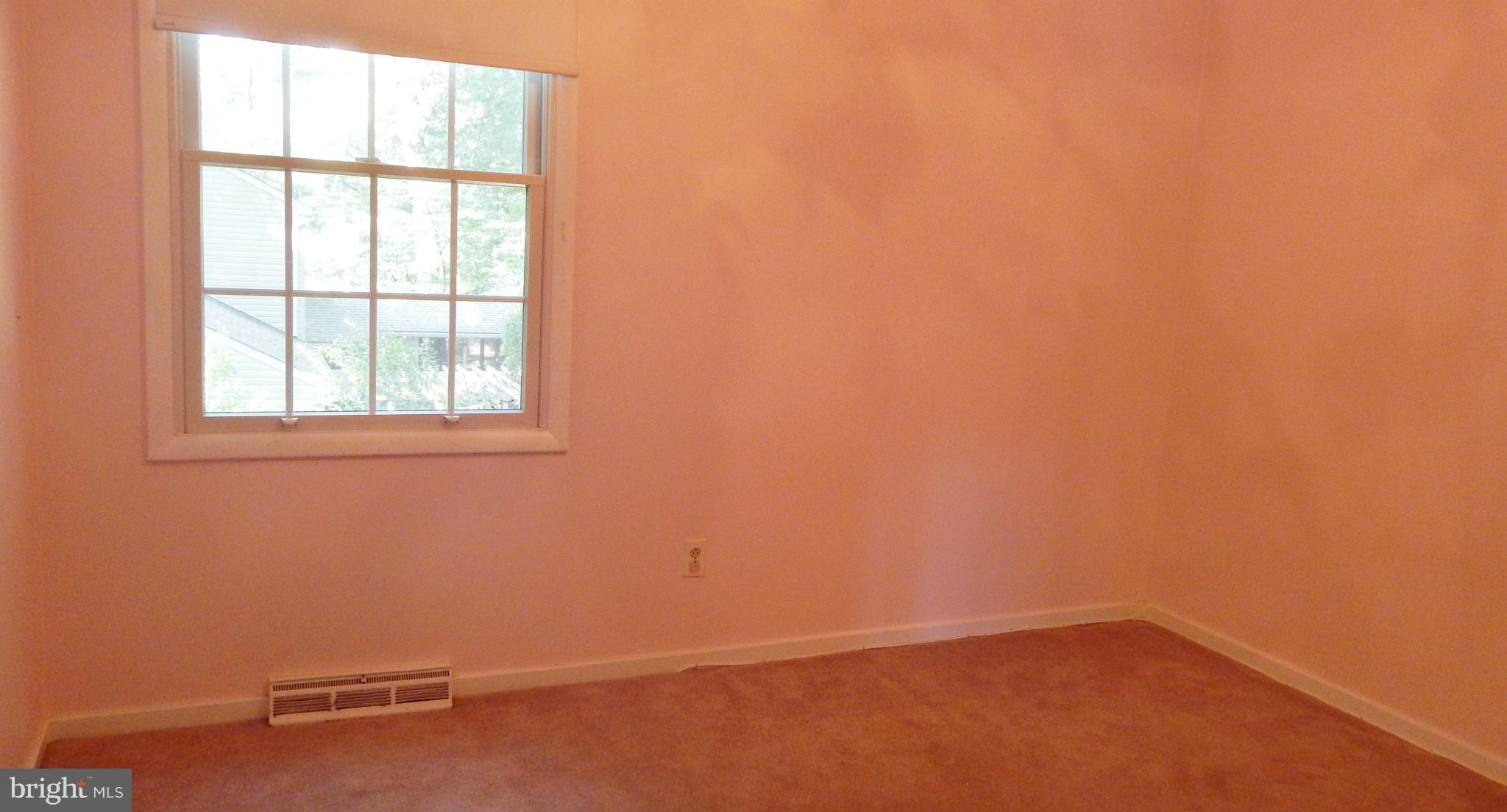 6032 Stevens Forest Road Columbia, MD 21045 - Photo 22 of 29 an empty room with a window