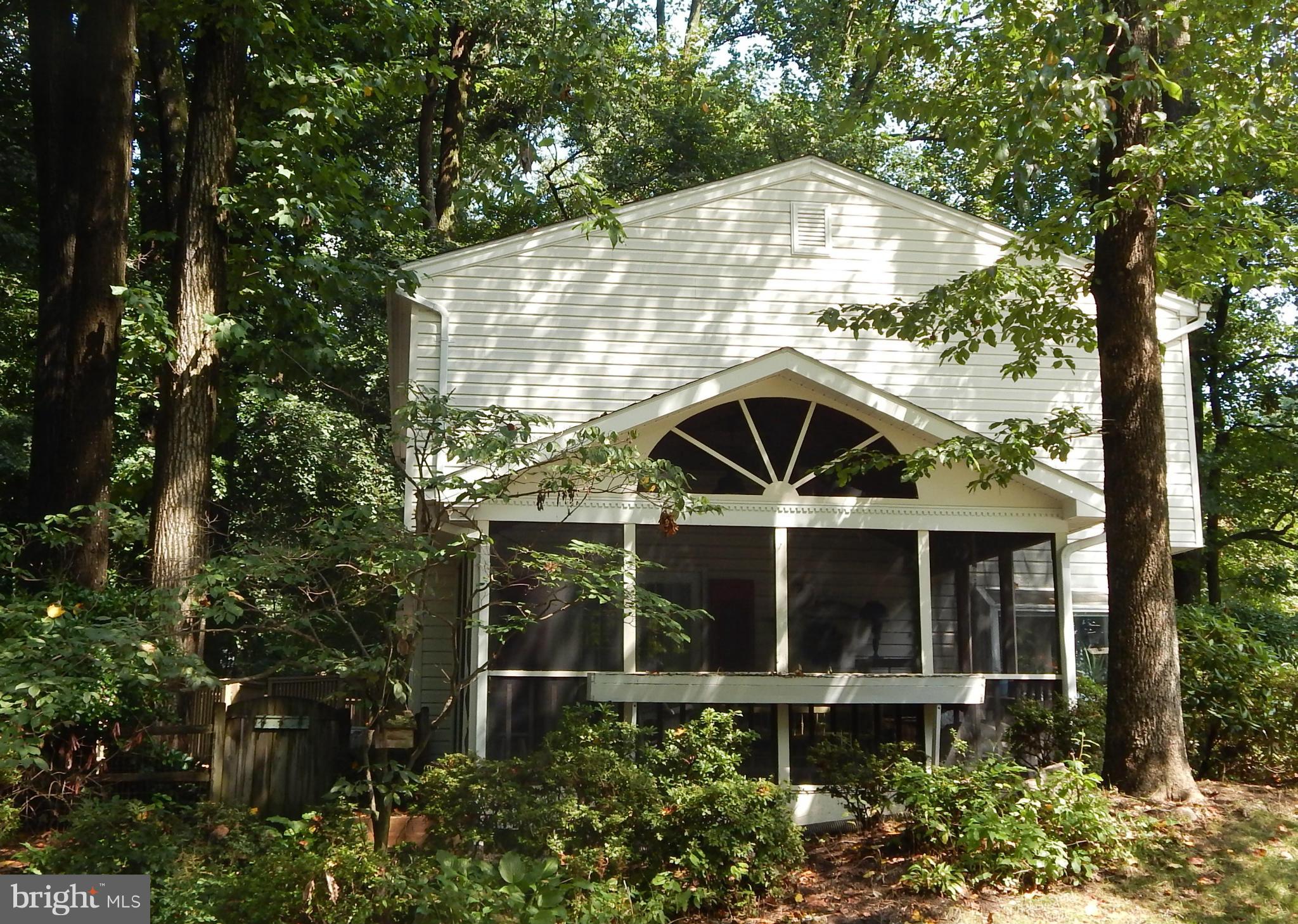 6032 Stevens Forest Road Columbia, MD 21045 - Photo 25 of 29 front view of a house with a yard