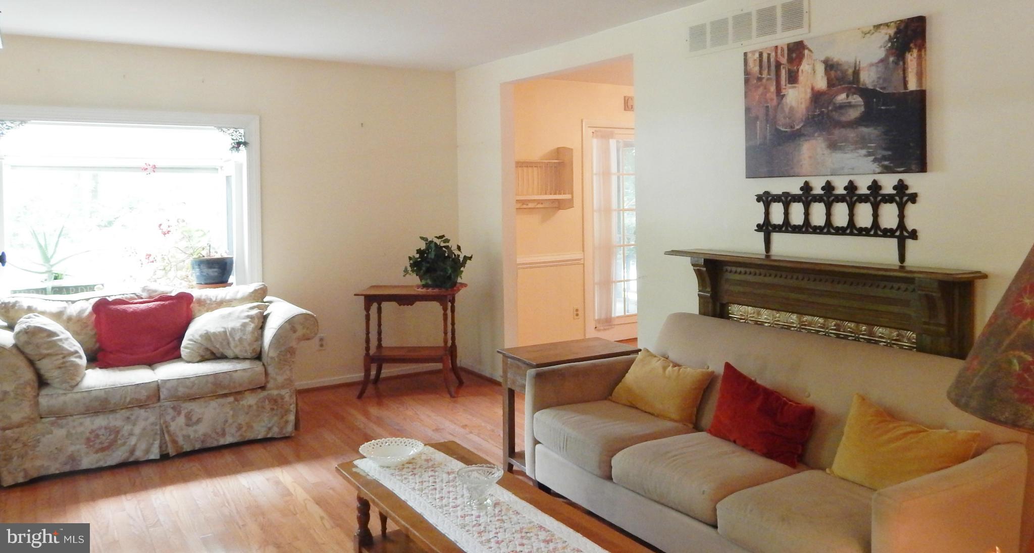 6032 Stevens Forest Road Columbia, MD 21045 - Photo 5 of 29 a living room with furniture and a window