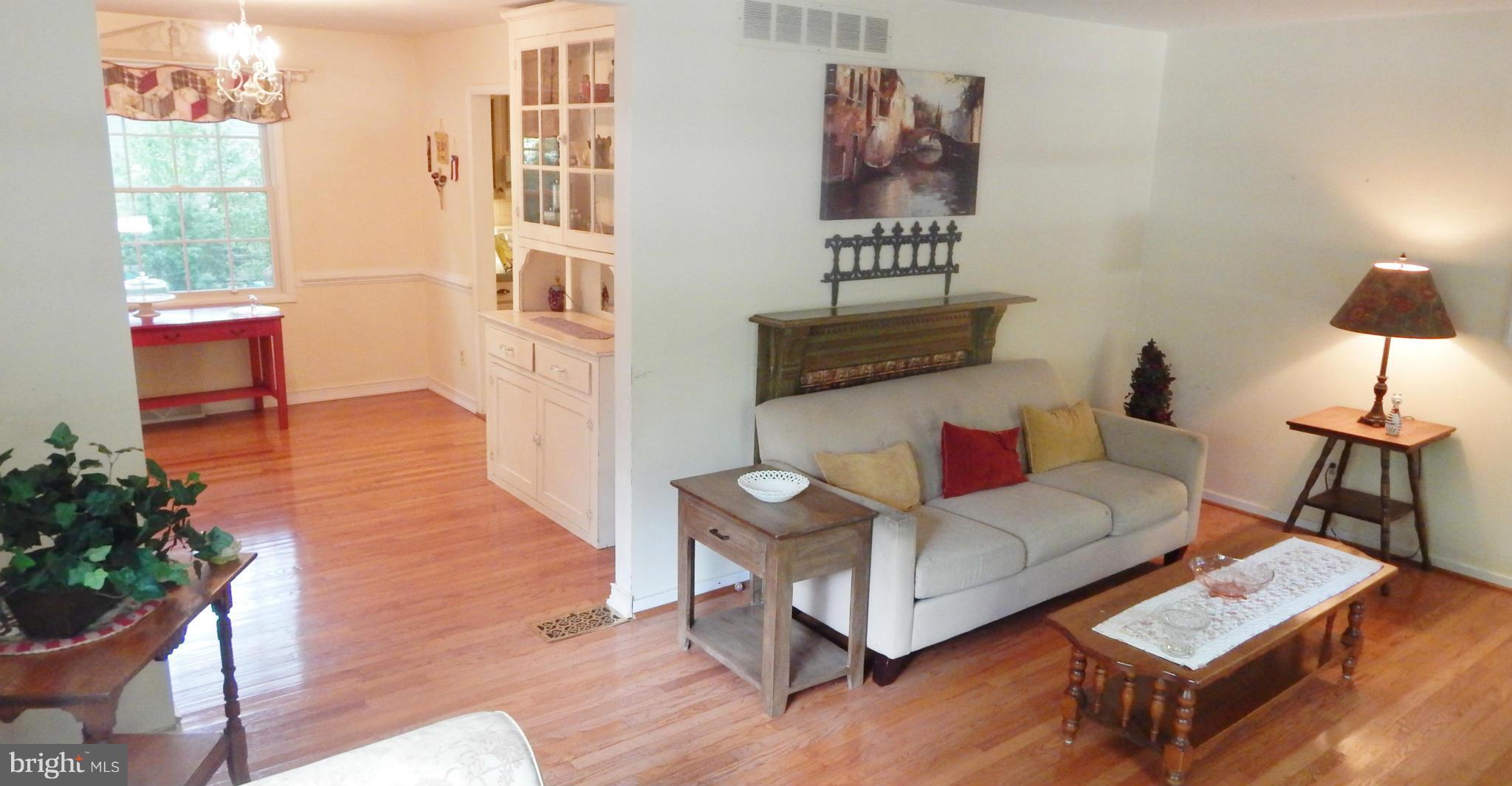 6032 Stevens Forest Road Columbia, MD 21045 - Photo 7 of 29 a living room with furniture and a window
