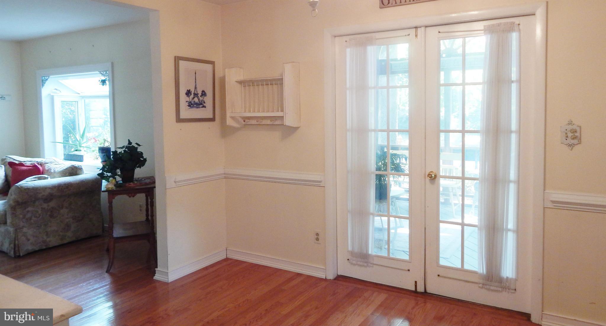 6032 Stevens Forest Road Columbia, MD 21045 - Photo 9 of 29 a living room with furniture and a window