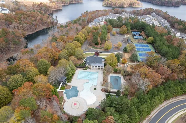 an aerial view of residential houses with outdoor space