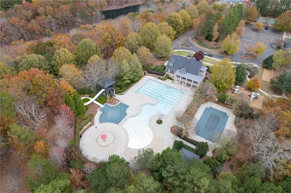 an aerial view of a house with outdoor space and street view