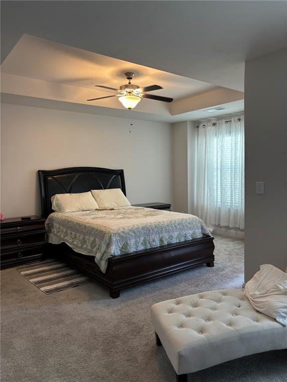 11208 Benton Loop Covington, GA 30014 - Photo 7 of 16 a bedroom with a bed and window