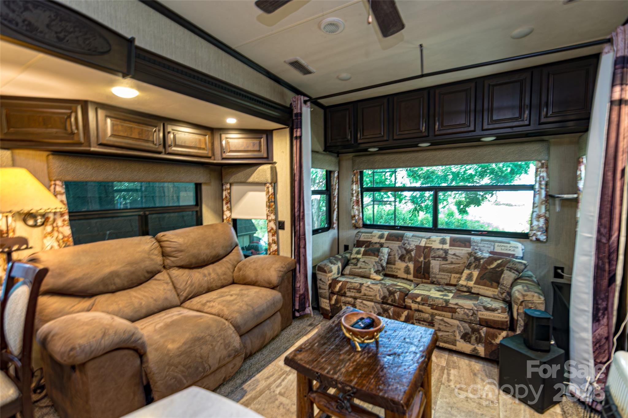 217 Mallard Loop Waynesville, NC 28785 - Photo 8 of 11 a living room with furniture and a large window