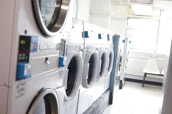 a view of living room with washer and dryer