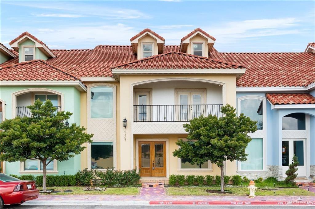 5307 North Crown Point Pharr, TX 78577 - Photo 1 of 11 Mediterranean / spanish-style home featuring french doors, a balcony, stucco siding, and a tile roof