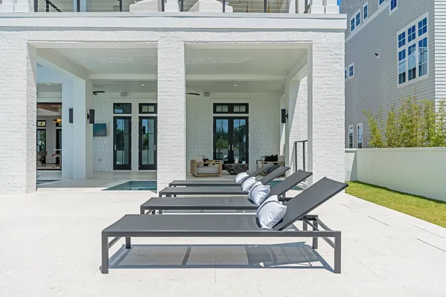 a kitchen with stainless steel appliances a stove a sink and a microwave