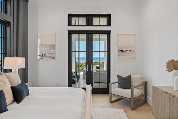 a white bath tub sitting in a bathroom and shower
