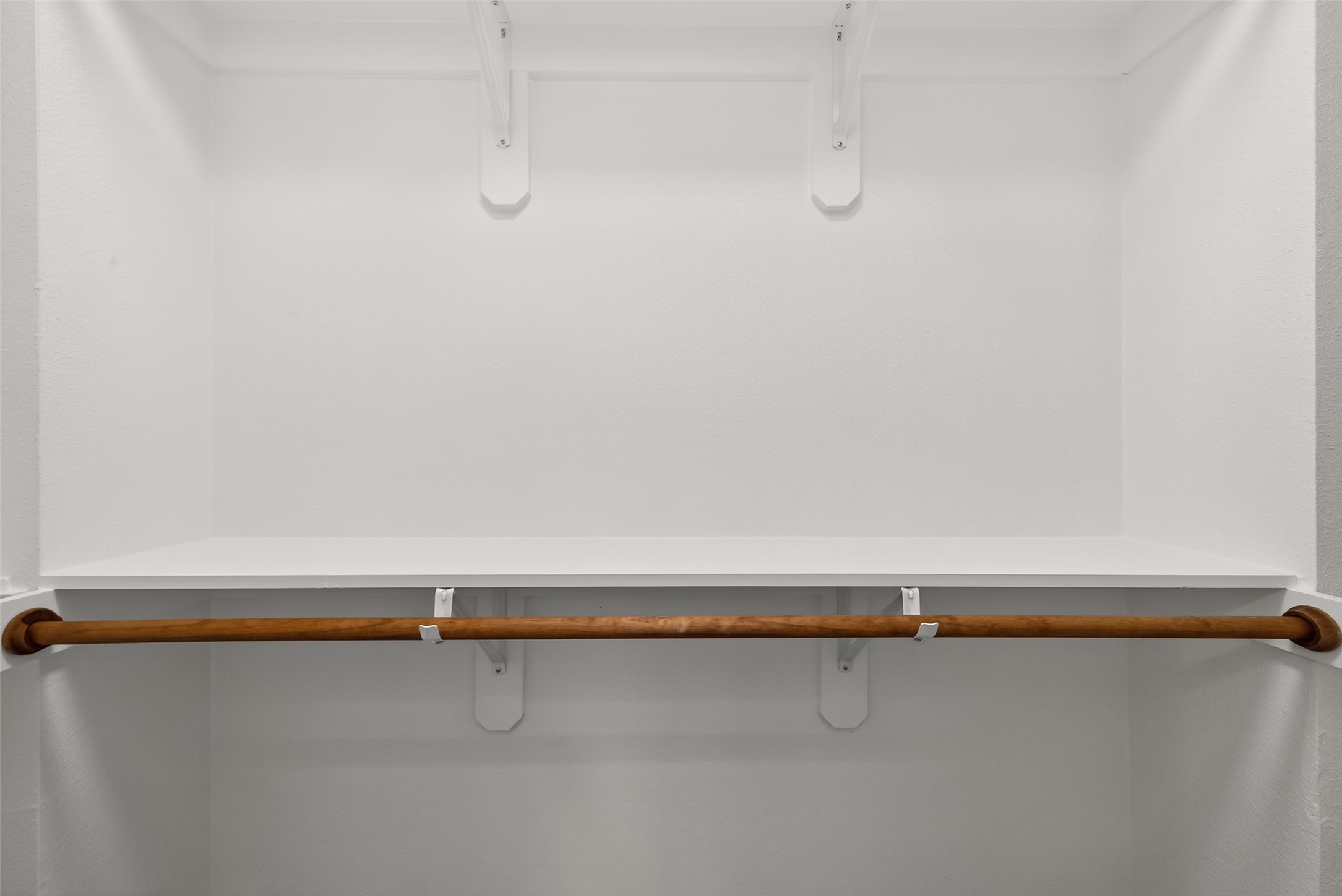 7047 Bissonnet Street, Unit 54 Houston, TX 77074 - Photo 29 of 30 a close up view of racks on the wall