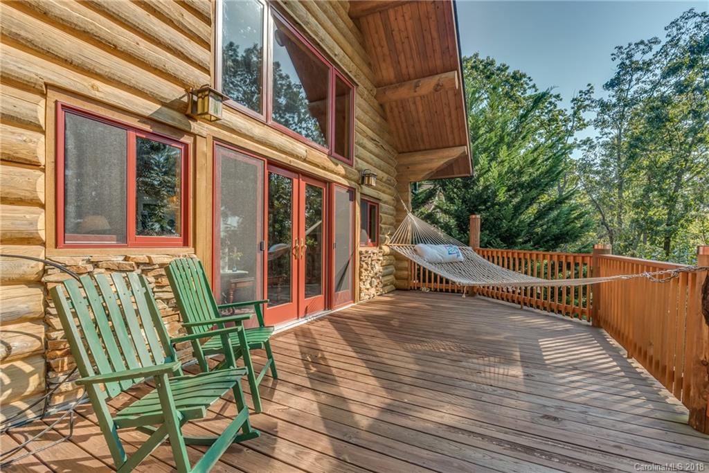 185 Caledonia Road Landrum, SC 29356 - Photo 3 of 30 a view of a chairs on the roof deck