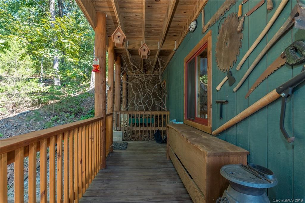 185 Caledonia Road Landrum, SC 29356 - Photo 27 of 30 a view of balcony with wooden floor and stairs