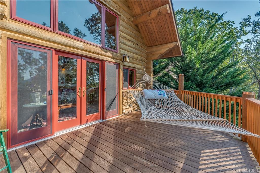 185 Caledonia Road Landrum, SC 29356 - Photo 8 of 30 a view of a roof deck with wooden floor and fence
