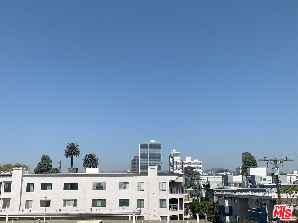 11767 Iowa Avenue, Unit 10 Los Angeles, CA 90025 - Photo 7 of 8 a view of residential buildings and street