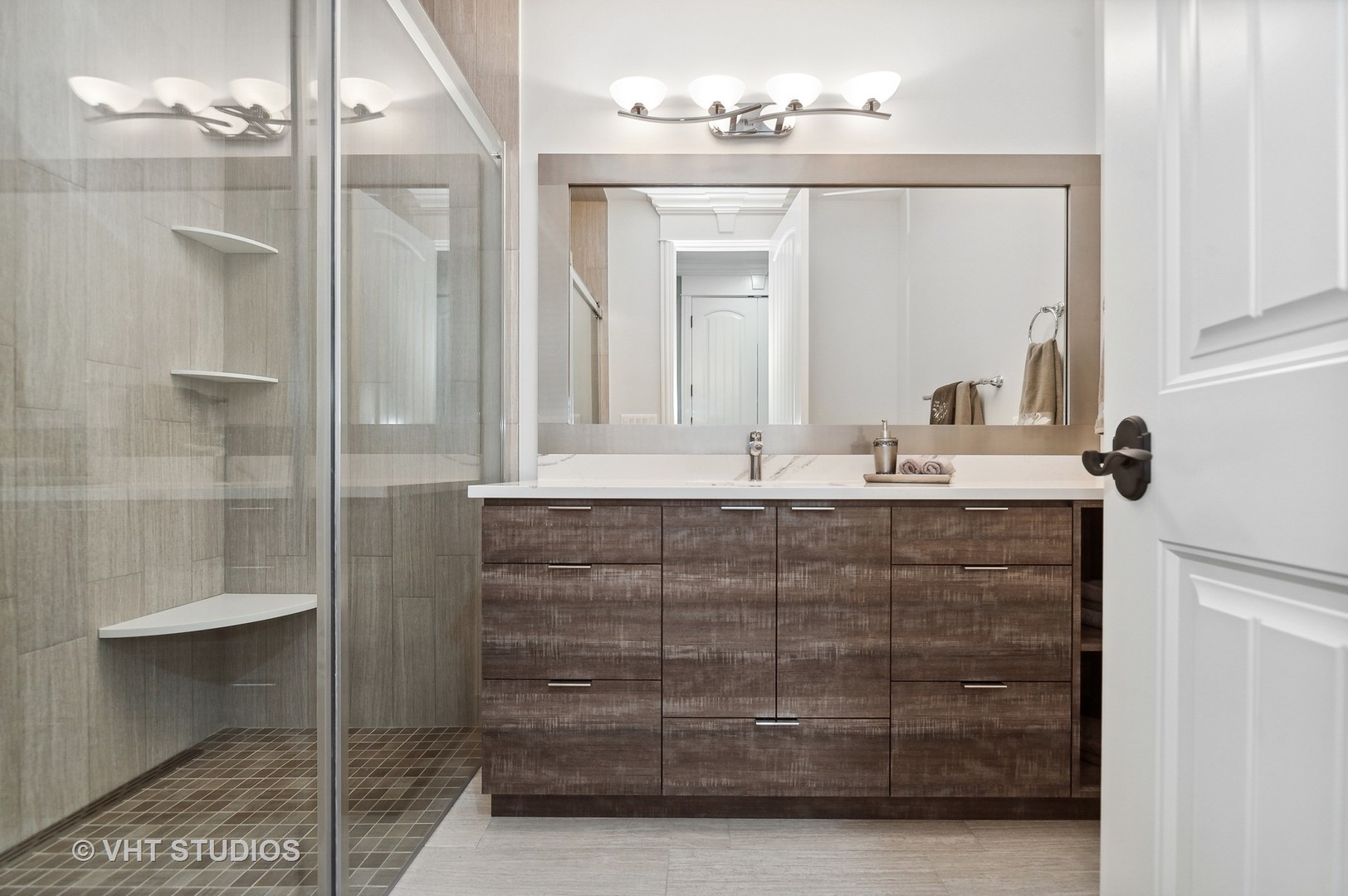 1010 Gladish Lane Glenview, IL 60025 - Photo 15 of 28 a bathroom with a sink and a mirror