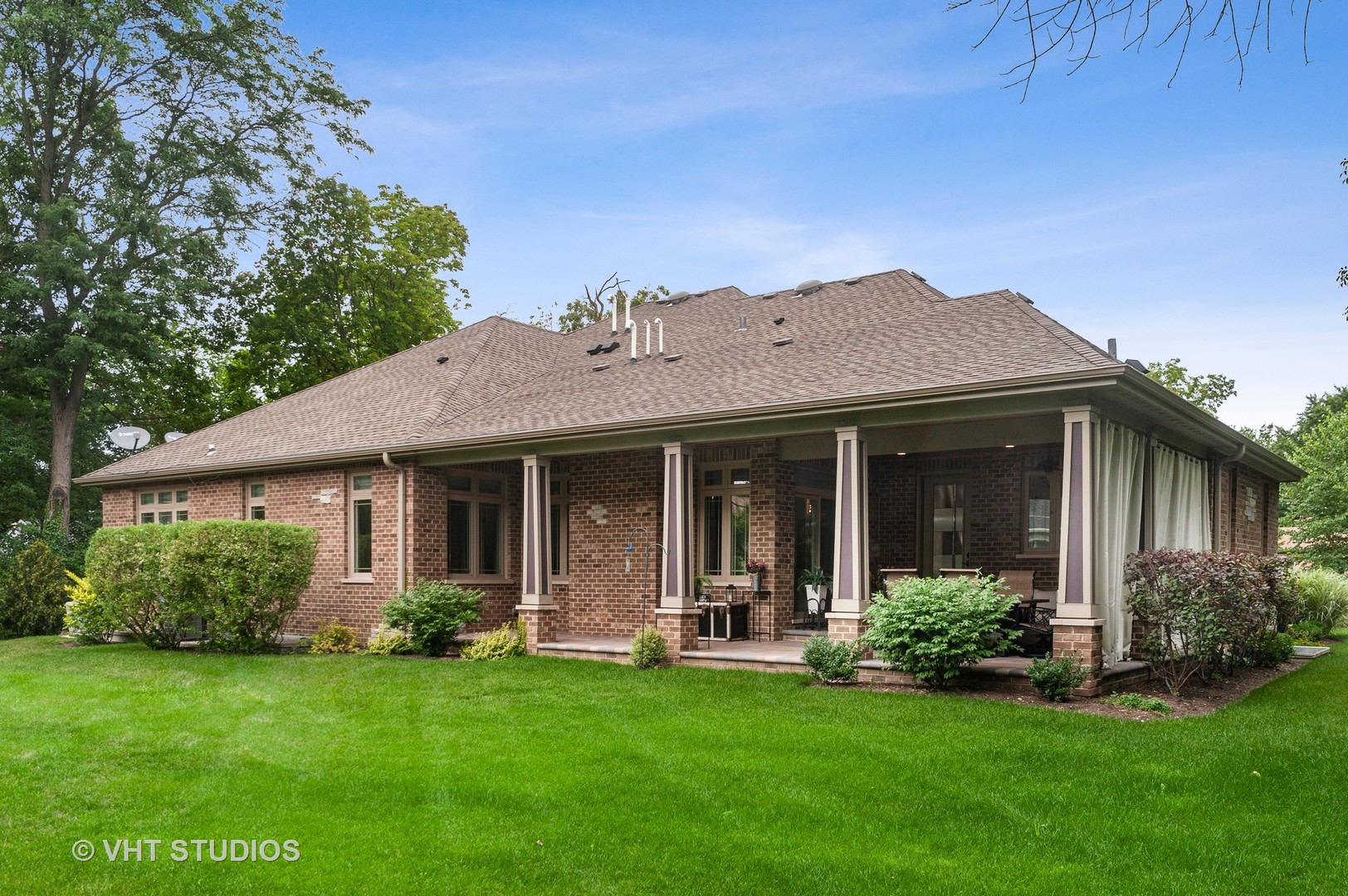 1010 Gladish Lane Glenview, IL 60025 - Photo 25 of 28 a view of a house with garden and porch