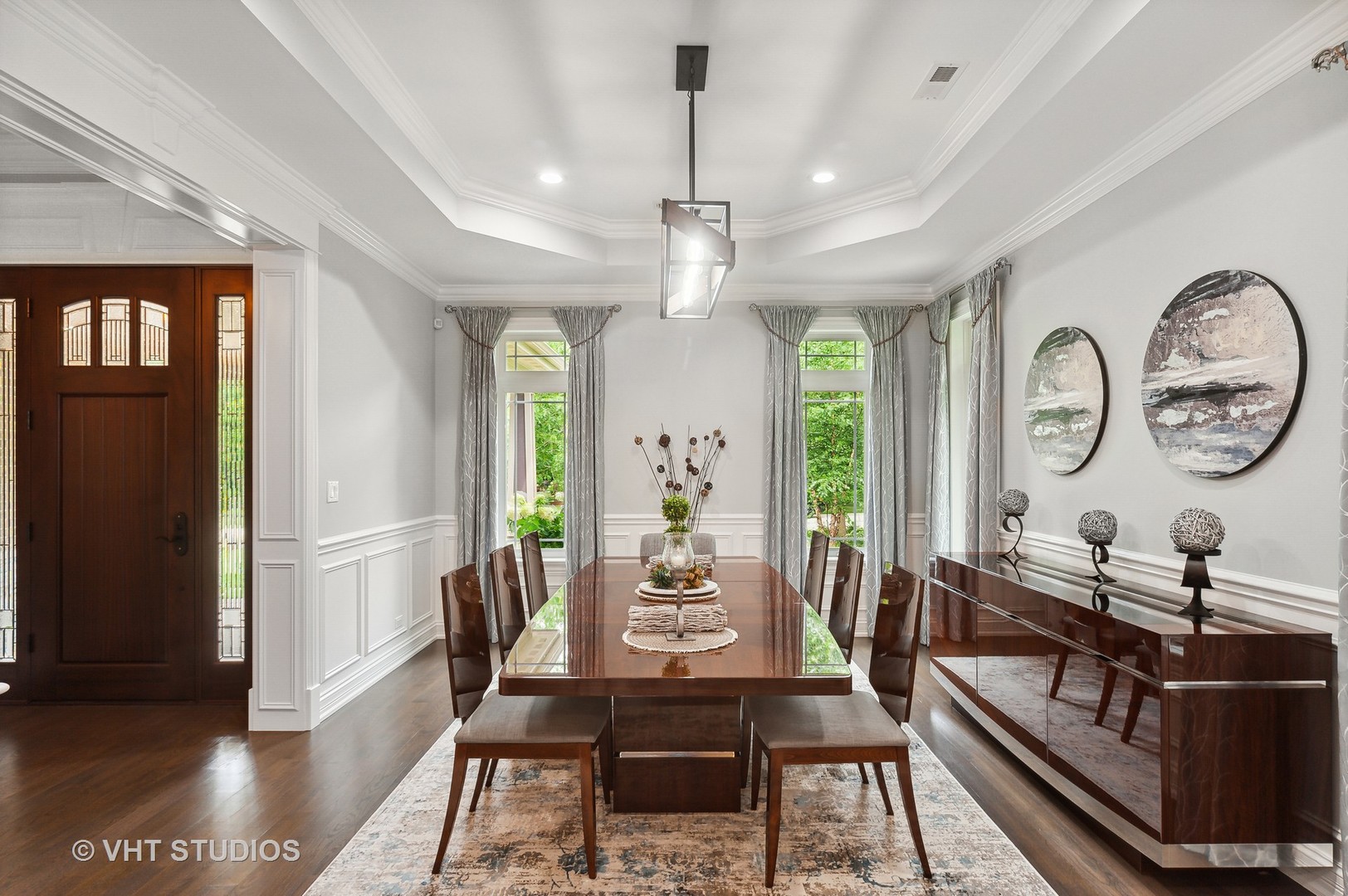 1010 Gladish Lane Glenview, IL 60025 - Photo 5 of 28 a view of a dining room with furniture window and wooden floor