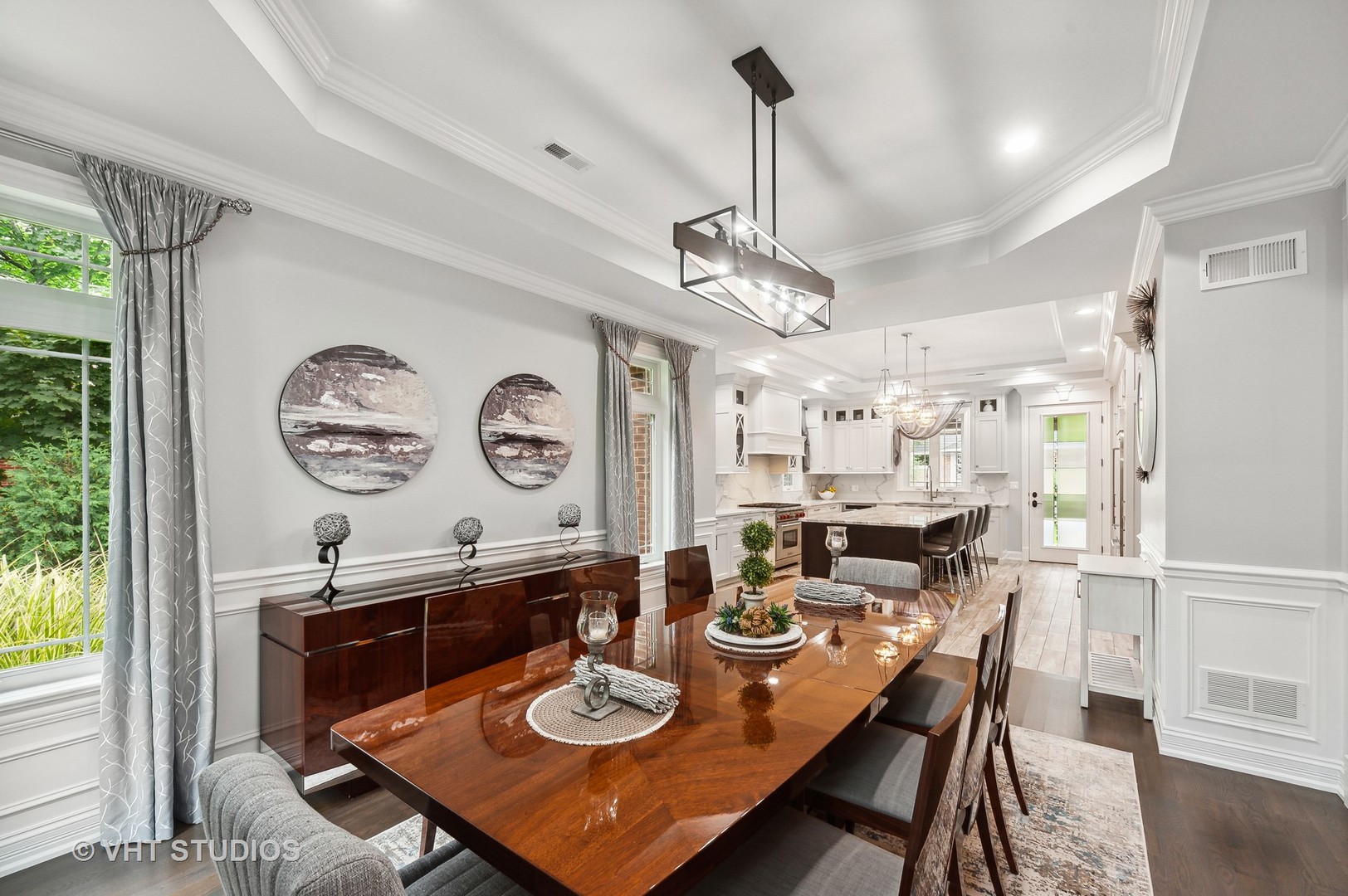 1010 Gladish Lane Glenview, IL 60025 - Photo 6 of 28 a view of a dining room with furniture large window and wooden floor