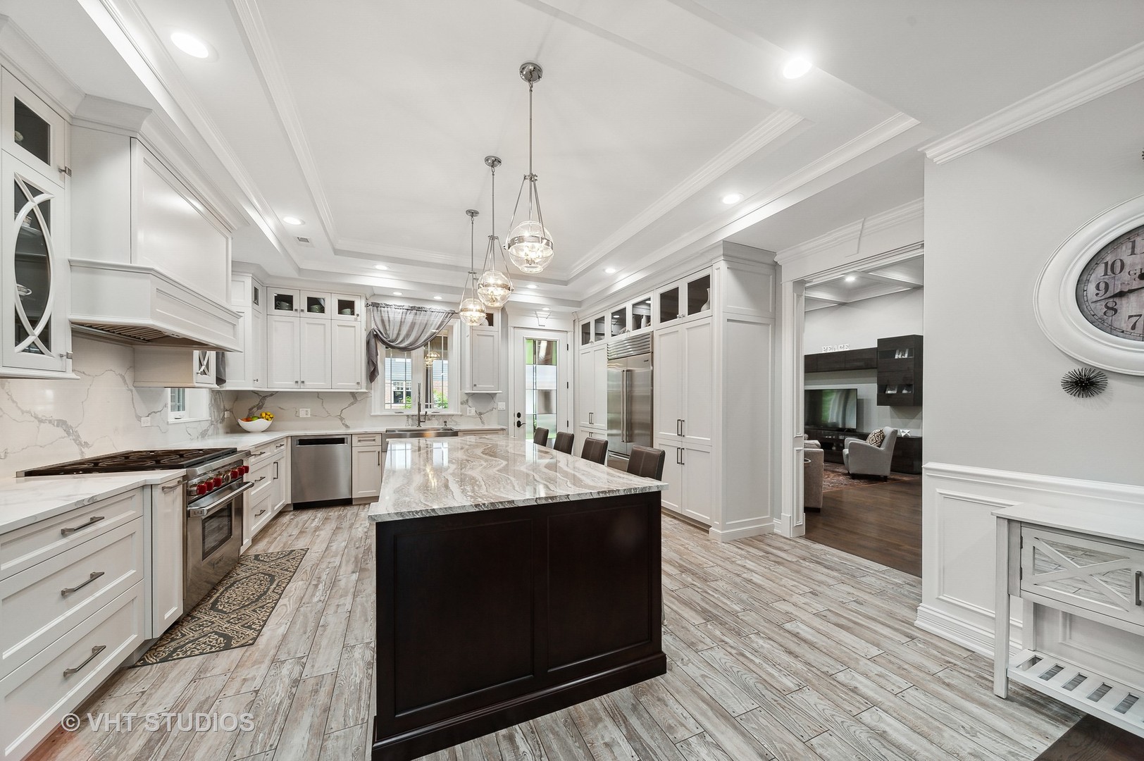 1010 Gladish Lane Glenview, IL 60025 - Photo 7 of 28 a large kitchen with cabinets a sink dishwasher a stove and a refrigerator