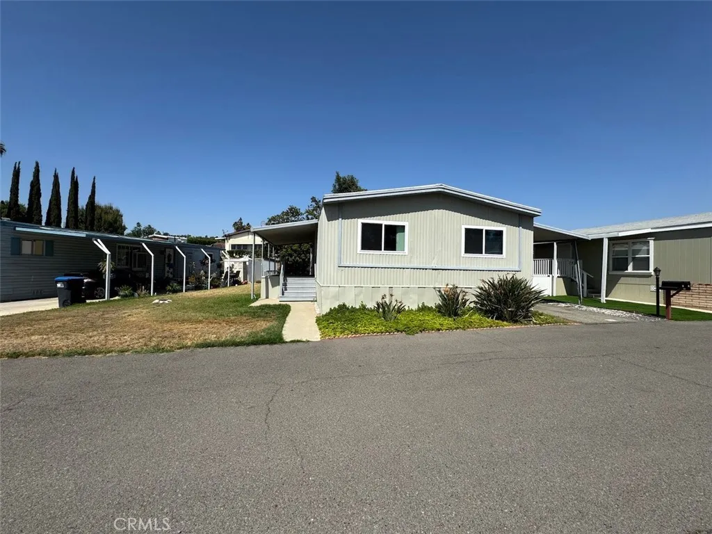 15181 Van Buren, Unit 60 Riverside, CA 92501 - Photo 1 of 1 Front middle