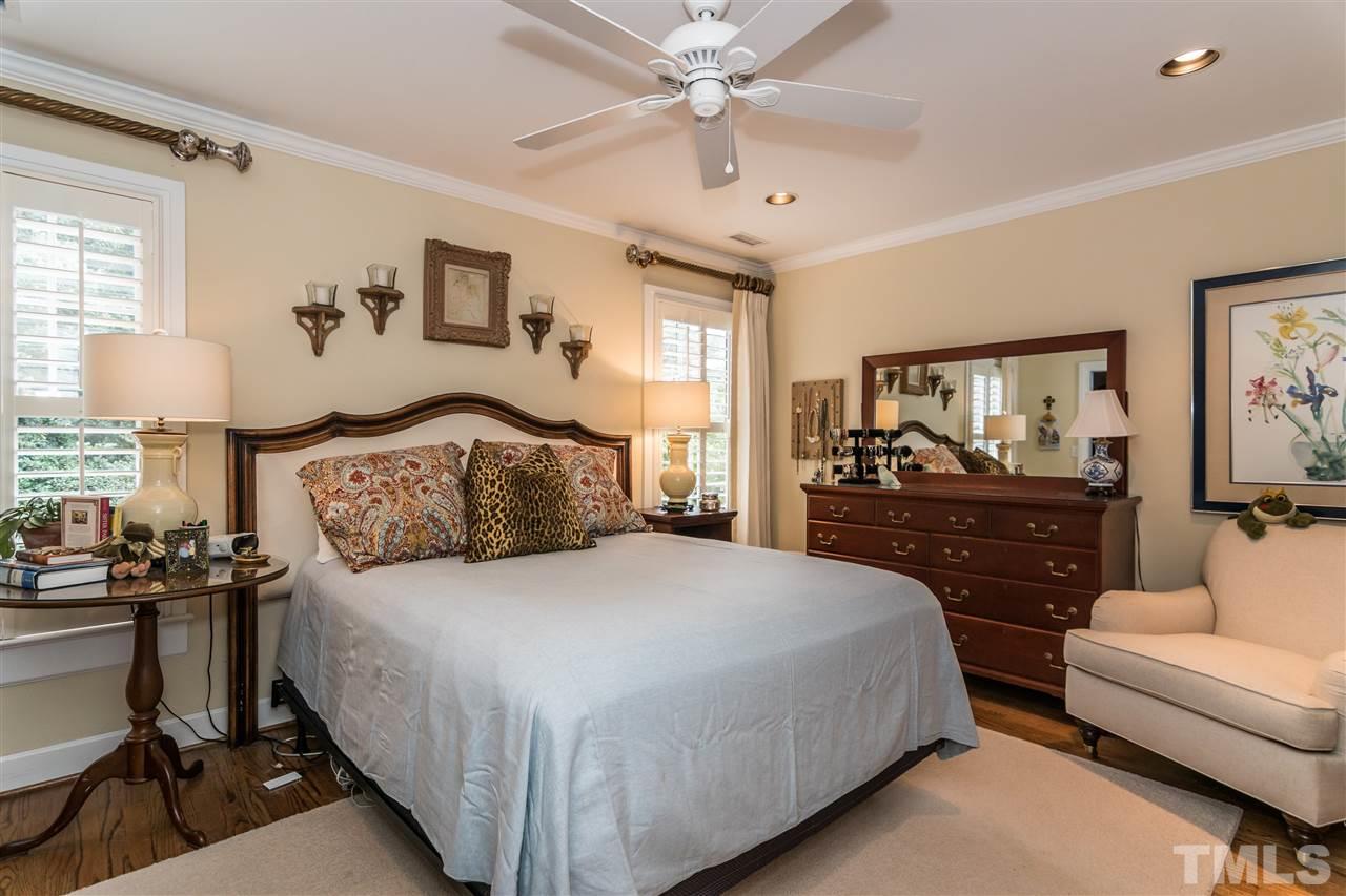 2320 Byrd Street Raleigh, NC 27608 - Photo 18 of 25 a bedroom with a bed and furniture