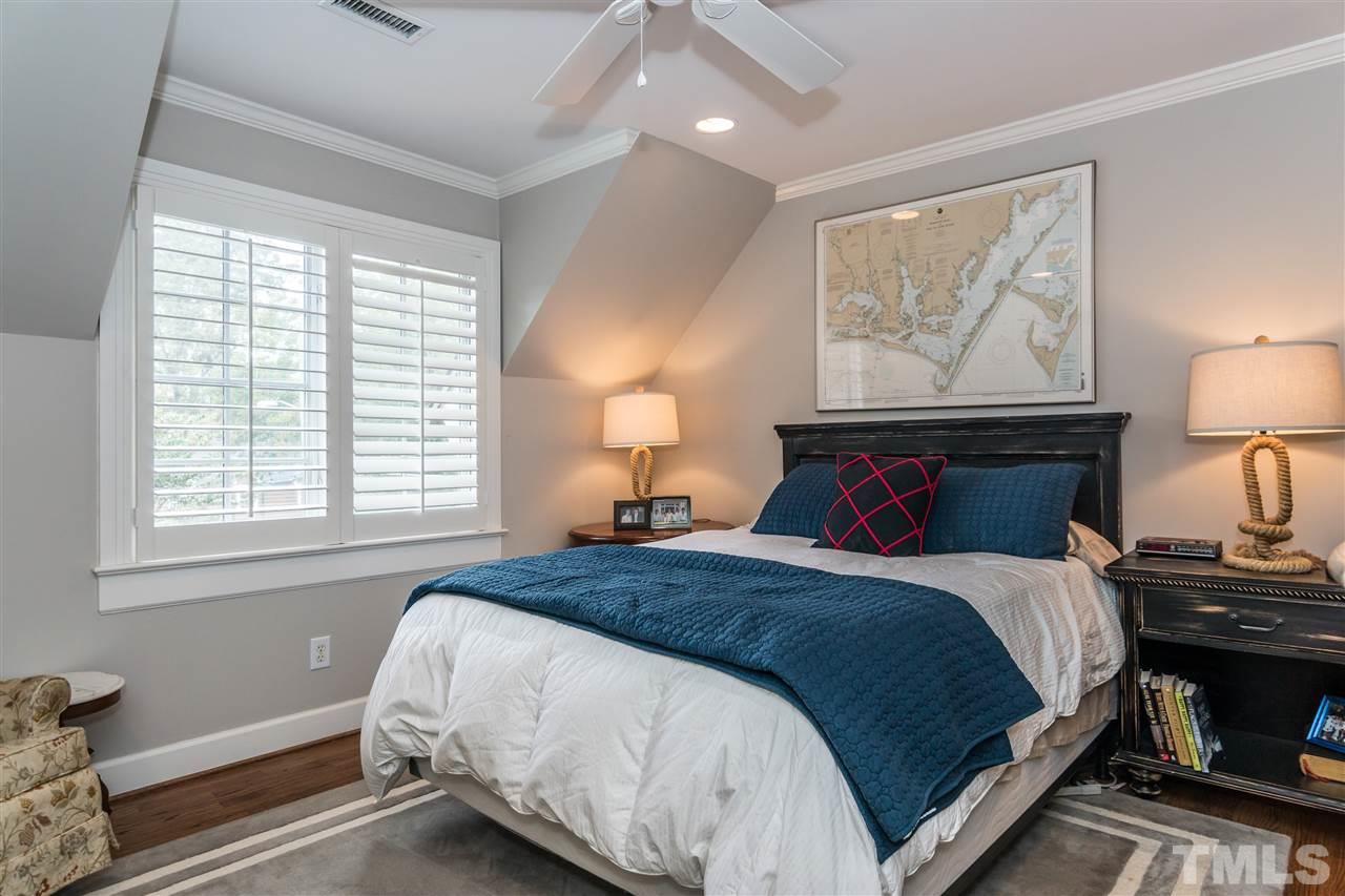 2320 Byrd Street Raleigh, NC 27608 - Photo 20 of 25 a bedroom with double bed and a window