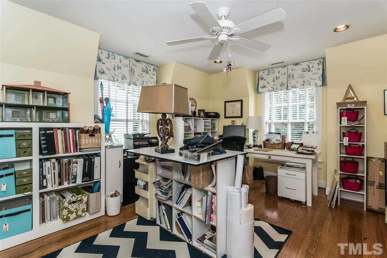 2320 Byrd Street Raleigh, NC 27608 - Photo 22 of 25 a kitchen with a stove a workspace and a window