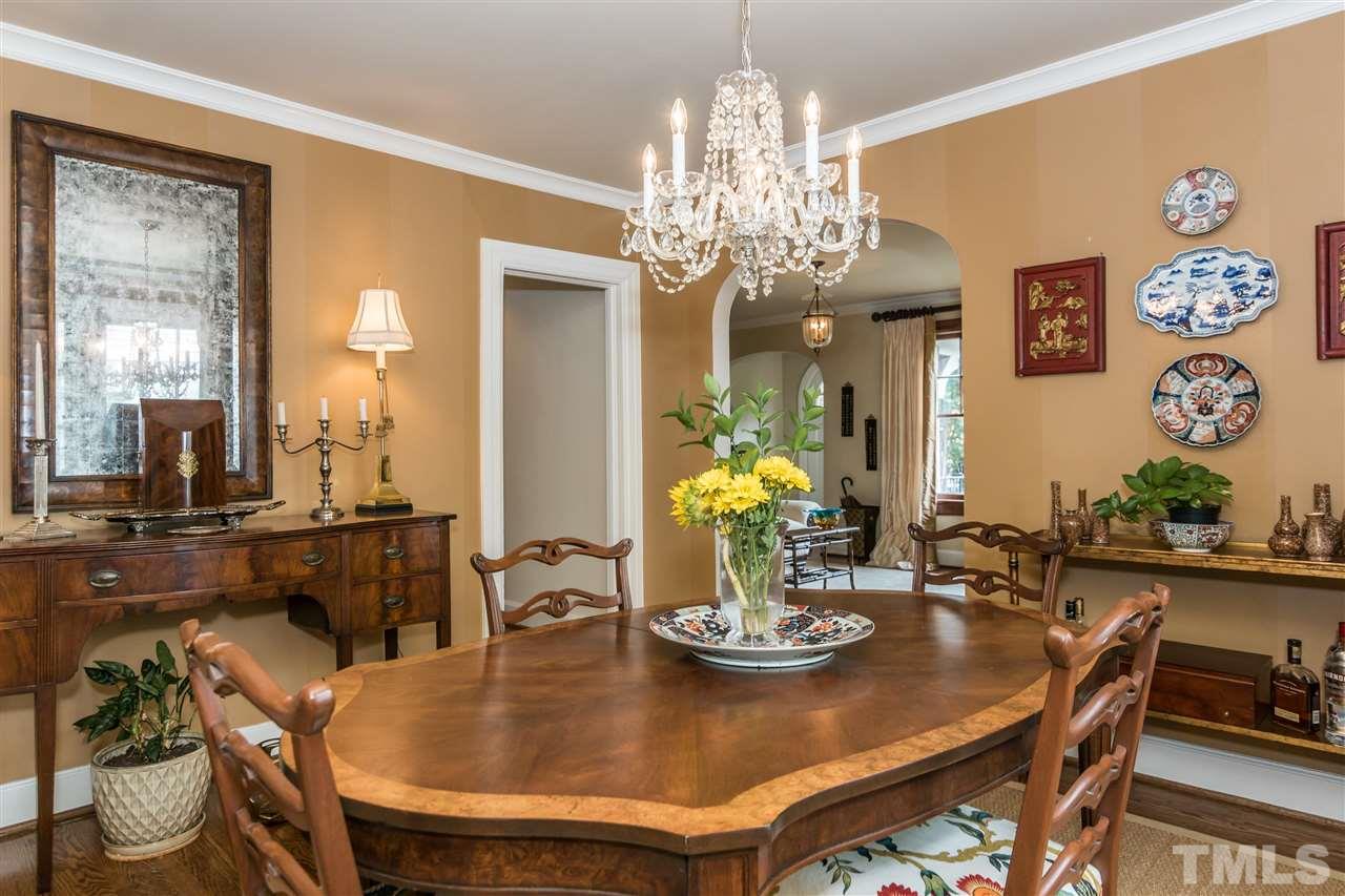 2320 Byrd Street Raleigh, NC 27608 - Photo 10 of 25 a view of a dining room with furniture and chandelier