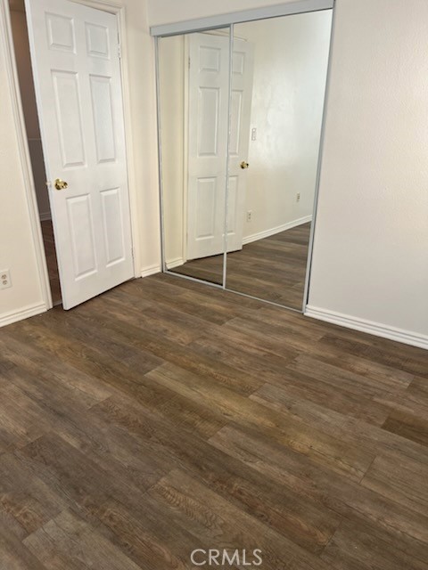 306 Lampman Way Placentia, CA 92870 - Photo 19 of 25 an empty room with wooden floor