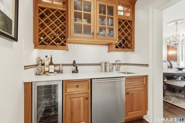 a kitchen with a sink and cabinets