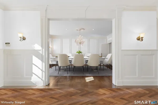 a view of a living room and dining room