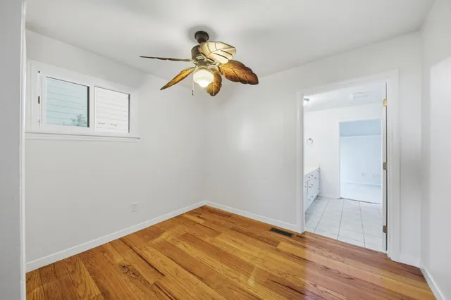 a bedroom with a bed and a closet