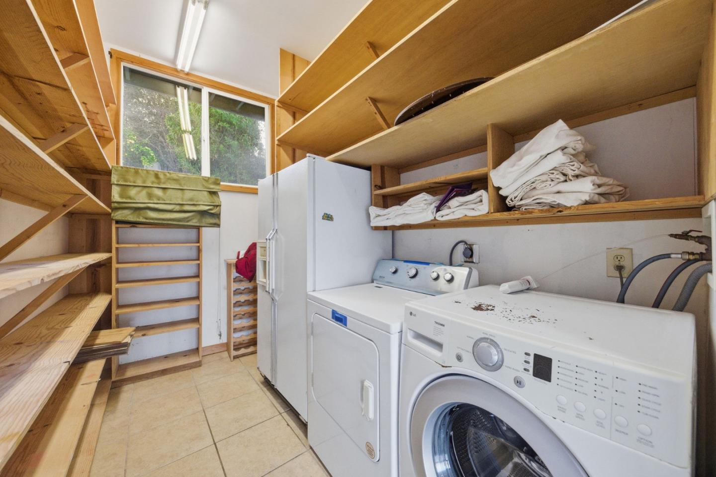 2312 Wooster Avenue Belmont, CA 94002 - Photo 15 of 18 a utility room with dryer and washer